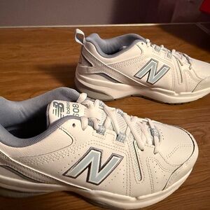 New Balance Light Blue and White Sneakers